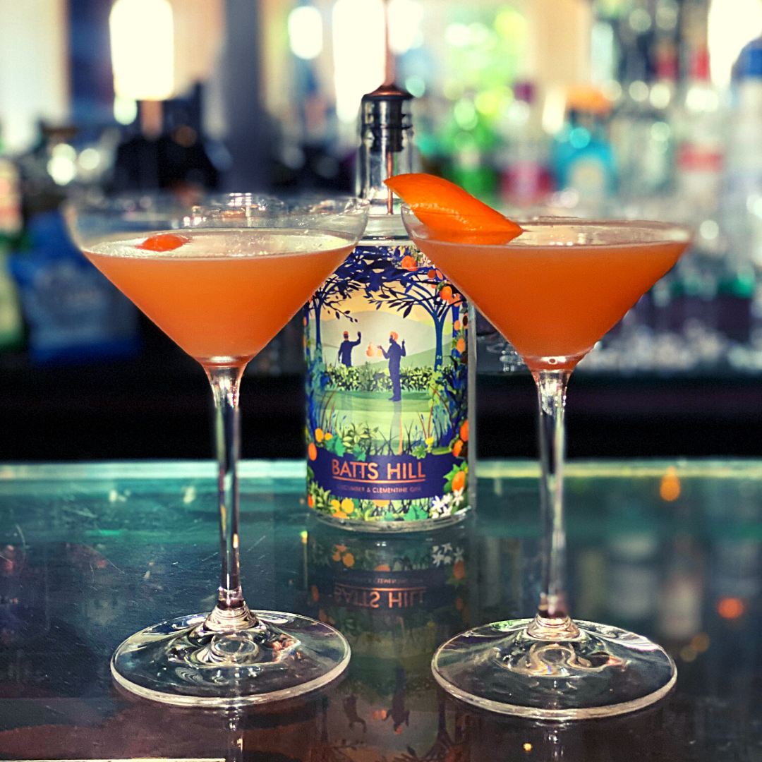Batts Hill Cucumber and Clementine Gin Old Flame cocktail with flamed orange peel garnish