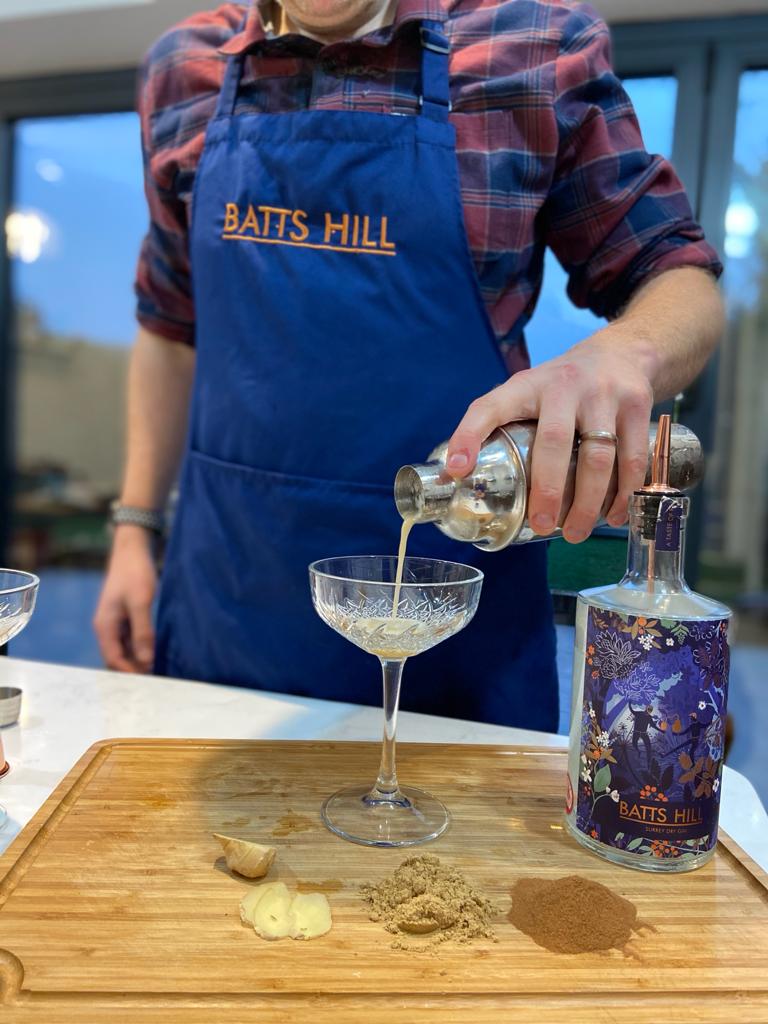 Batts Hill Ginger Gin Sour cocktail with egg white foam and ginger garnish