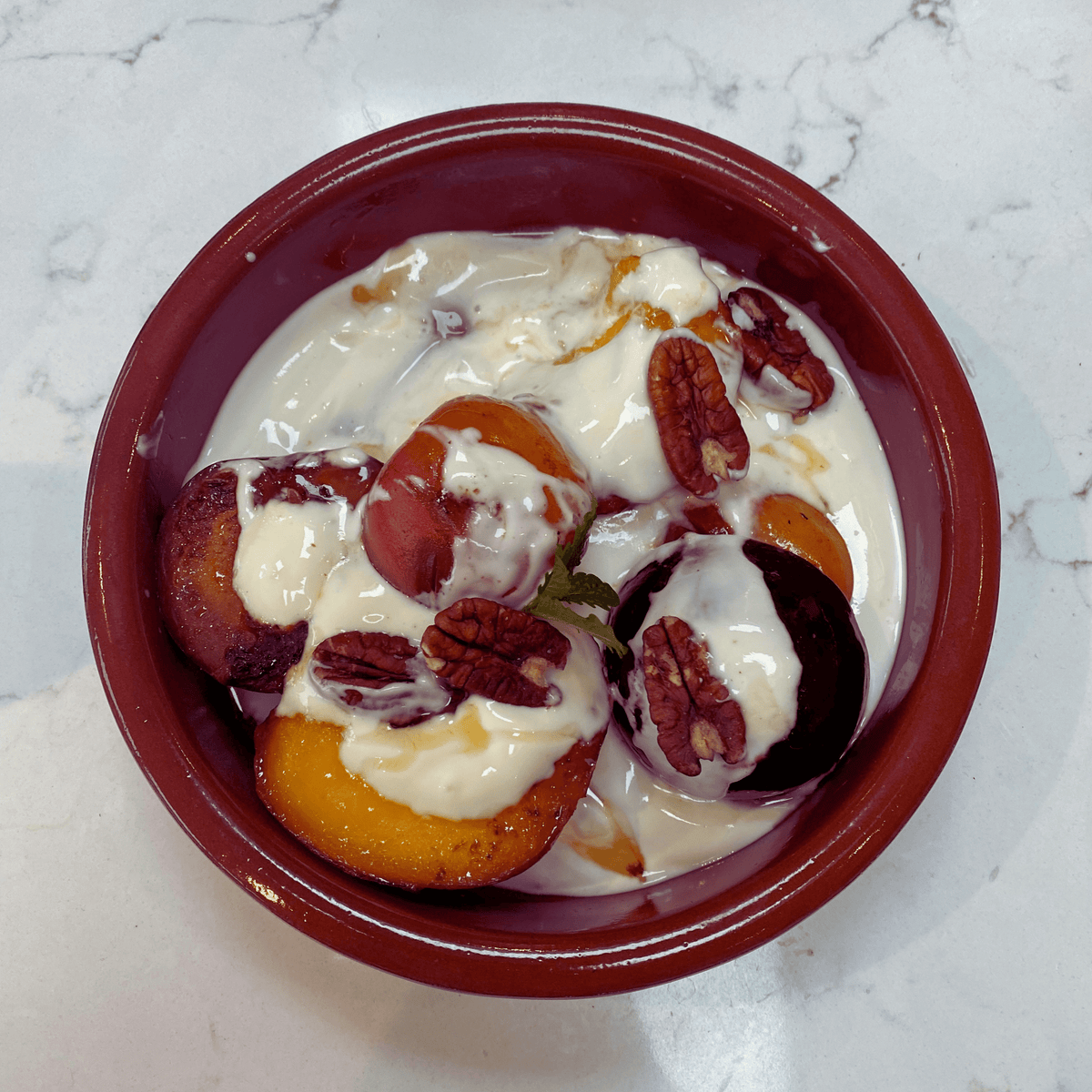Batts Hill Cucumber and Clementine Gin soaked stone fruit with honey mint yogurt