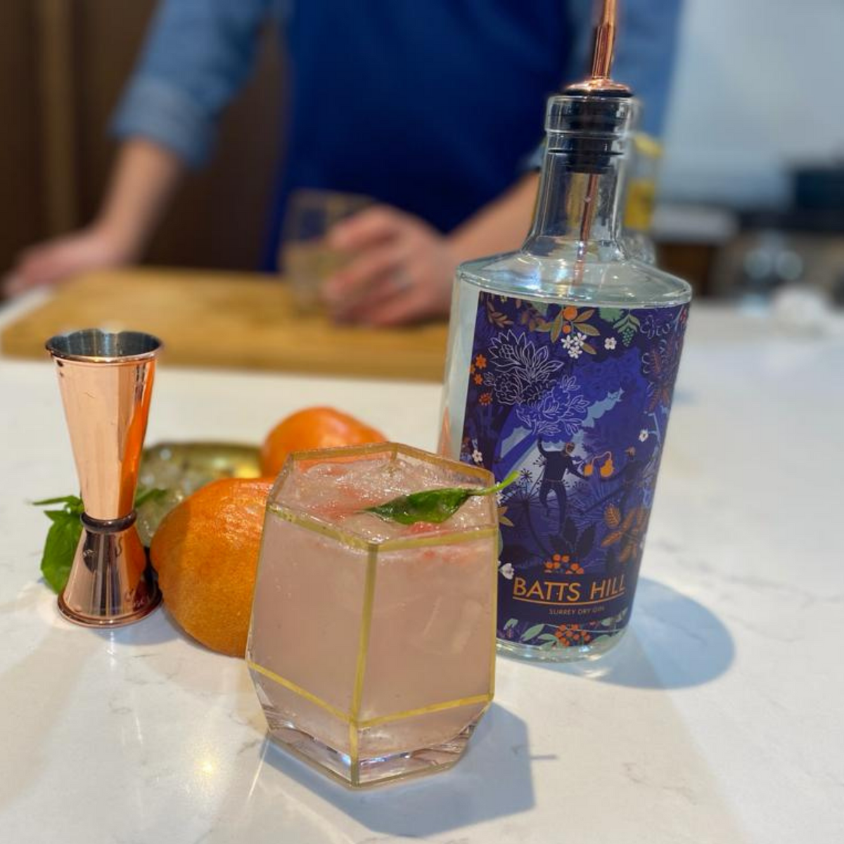 Batts Hill Surrey Dry Gin Grapefruit G&T with basil garnish